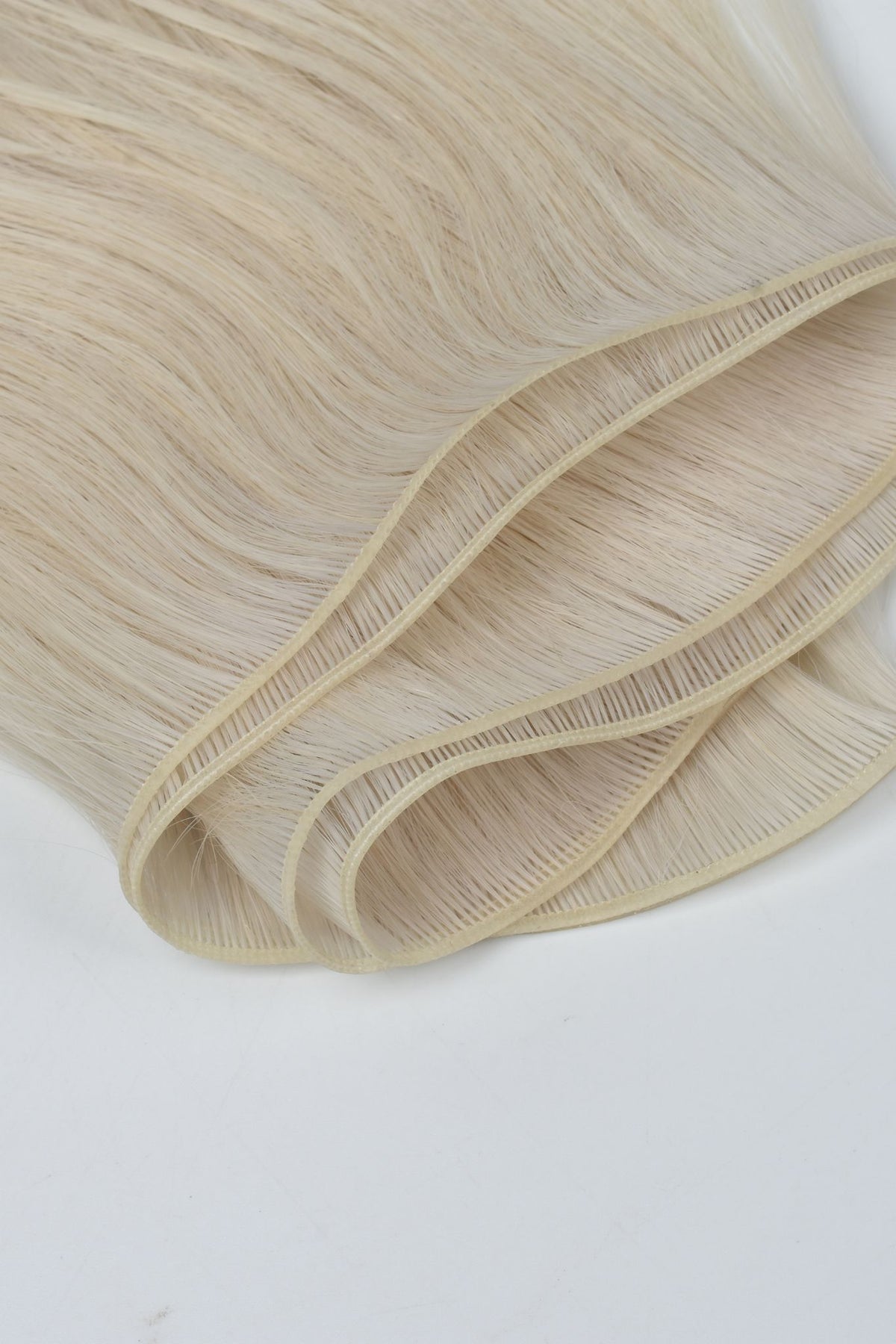 #60 Whitest Ash Blonde Genius Weft Extensions